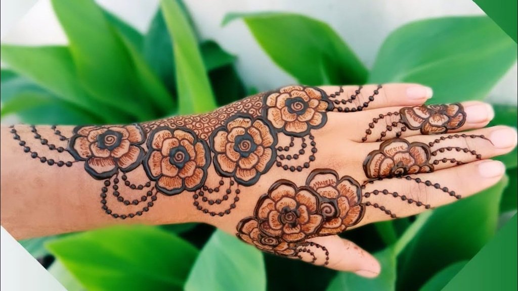 10 Best Back Hand Mehndi Designs in 2025 7 back hand mehndi design,simple mehndi design,mehndi design simple,arabic mehndi design,easy mehndi design back hand mehndi design 10 Best Back Hand Mehndi Designs in 2025 Rose Mehndi Design for Back Hand