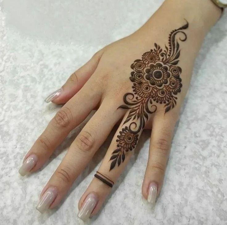 Top 10 Back Hand Mehndi Design for Karva Chauth 5 back hand mehndi design for karva chauth,modern karva chauth mehndi designs back hand mehndi design for karva chauth Top 10 Back Hand Mehndi Design for Karva Chauth back hand mehndi design for karva chauth