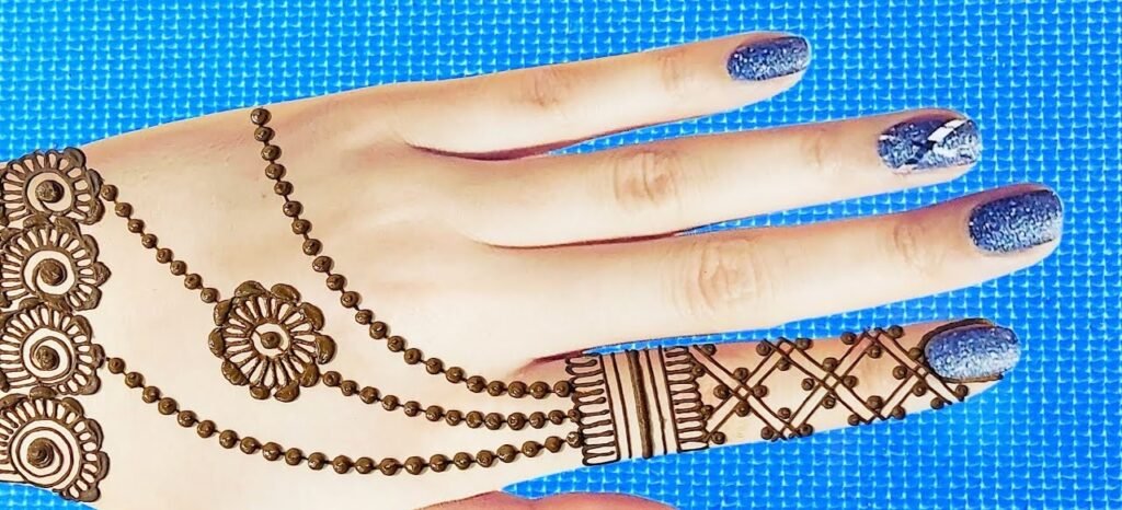 Top 10 Mehndi Design Back Hand Easy – Stunning Yet Simple Designs to Try 5 mehndi design back hand easy,mehndi design simple back hand,simple mehndi design back hand easy,stylish mehndi design back hand easy,bridal mehndi design back hand easy mehndi design back hand easy Top 10 Mehndi Design Back Hand Easy – Stunning Yet Simple Designs to Try mehndi design back hand easy